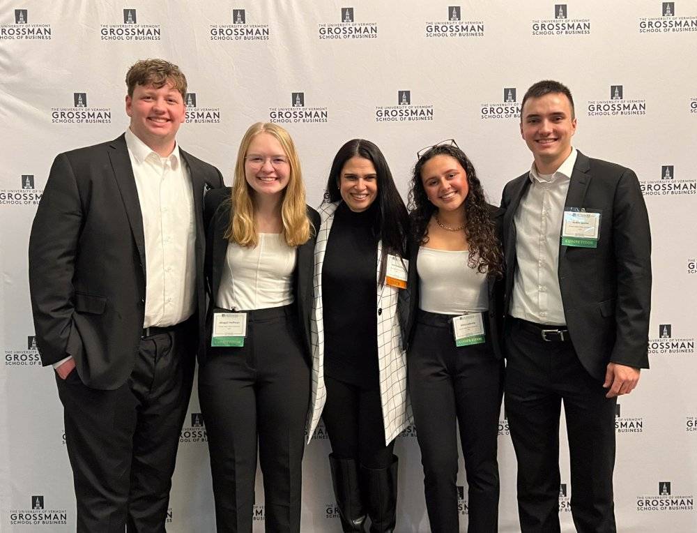 From left, Teddy Rounds, Abby Hoffman, team advisor Ana Gonzalez, Alina Ladewig and Justin Quinn pose for a photo at the Schlesinger Global Family Enterprise Case Competition at the University of Vermont.